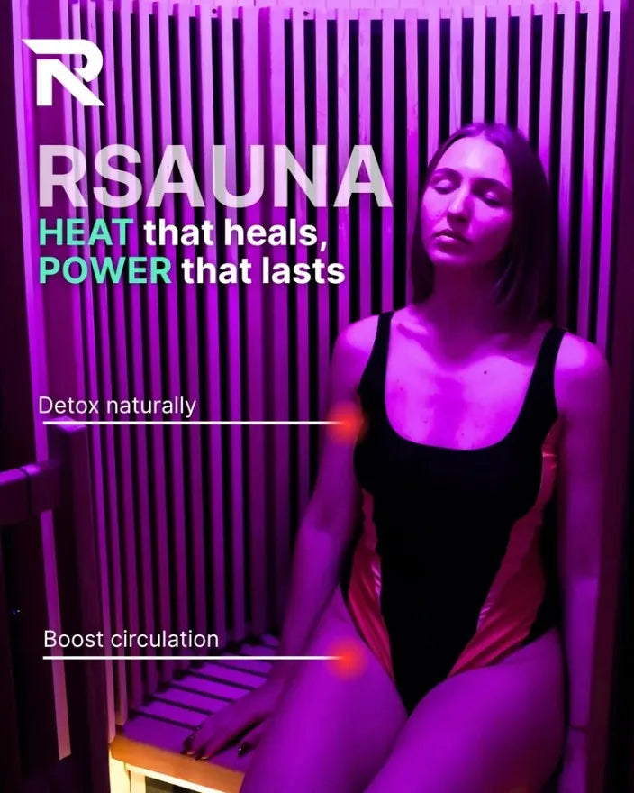 User in violet chromotherapy light inside the R Sauna Circle infrared sauna for detox and circulation